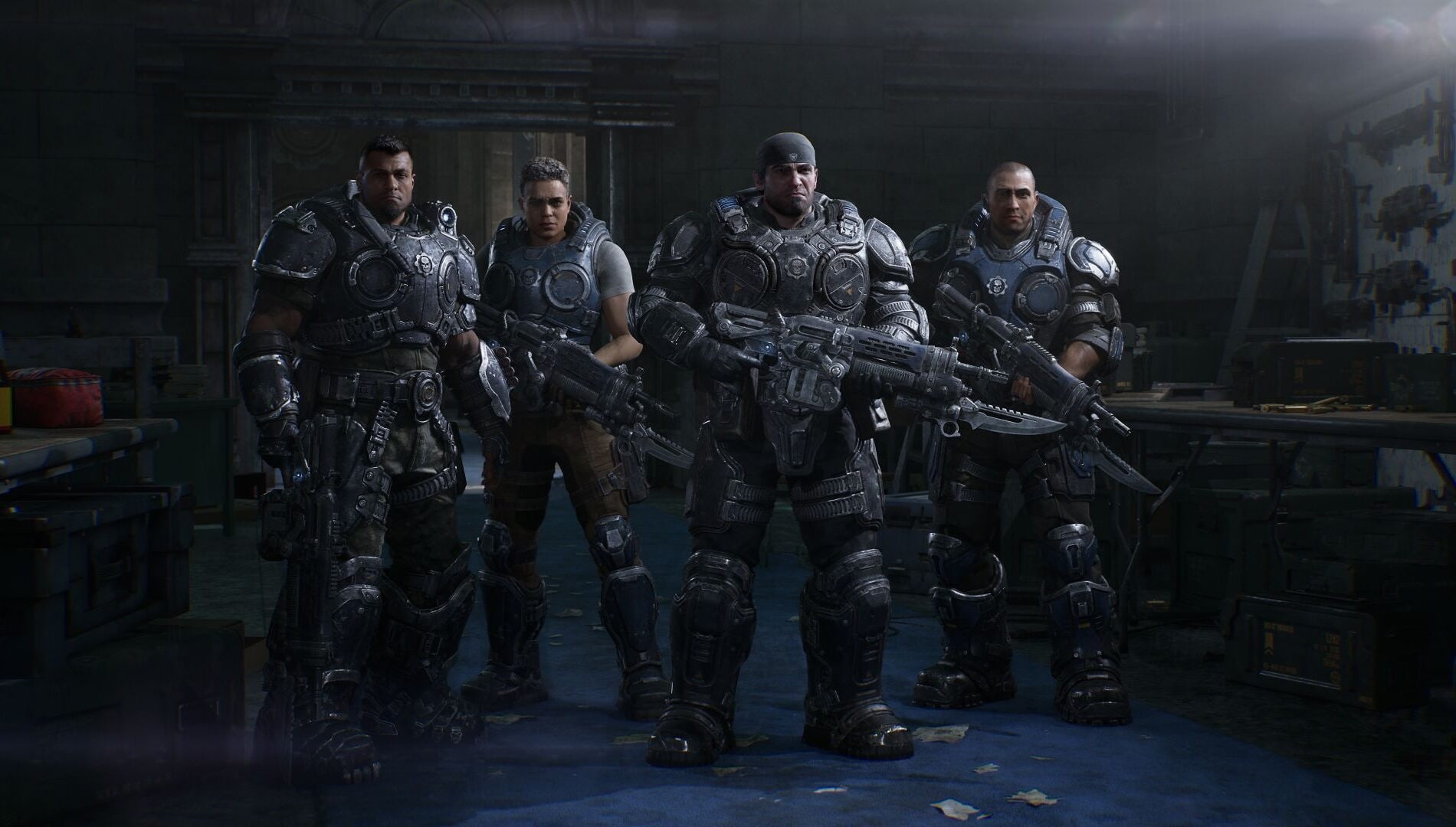 Gears of War E day 3 Four Heavily Armored Soldiers Stand Side by Side in a Dim Industrial Room Rifles at the Ready