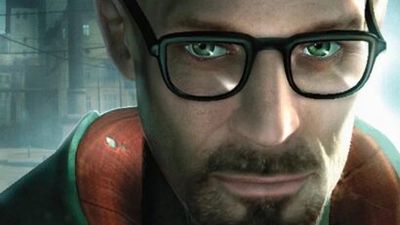 Close-up portrait of a man with black glasses and green eyes, looking at the camera, urban background behind him.