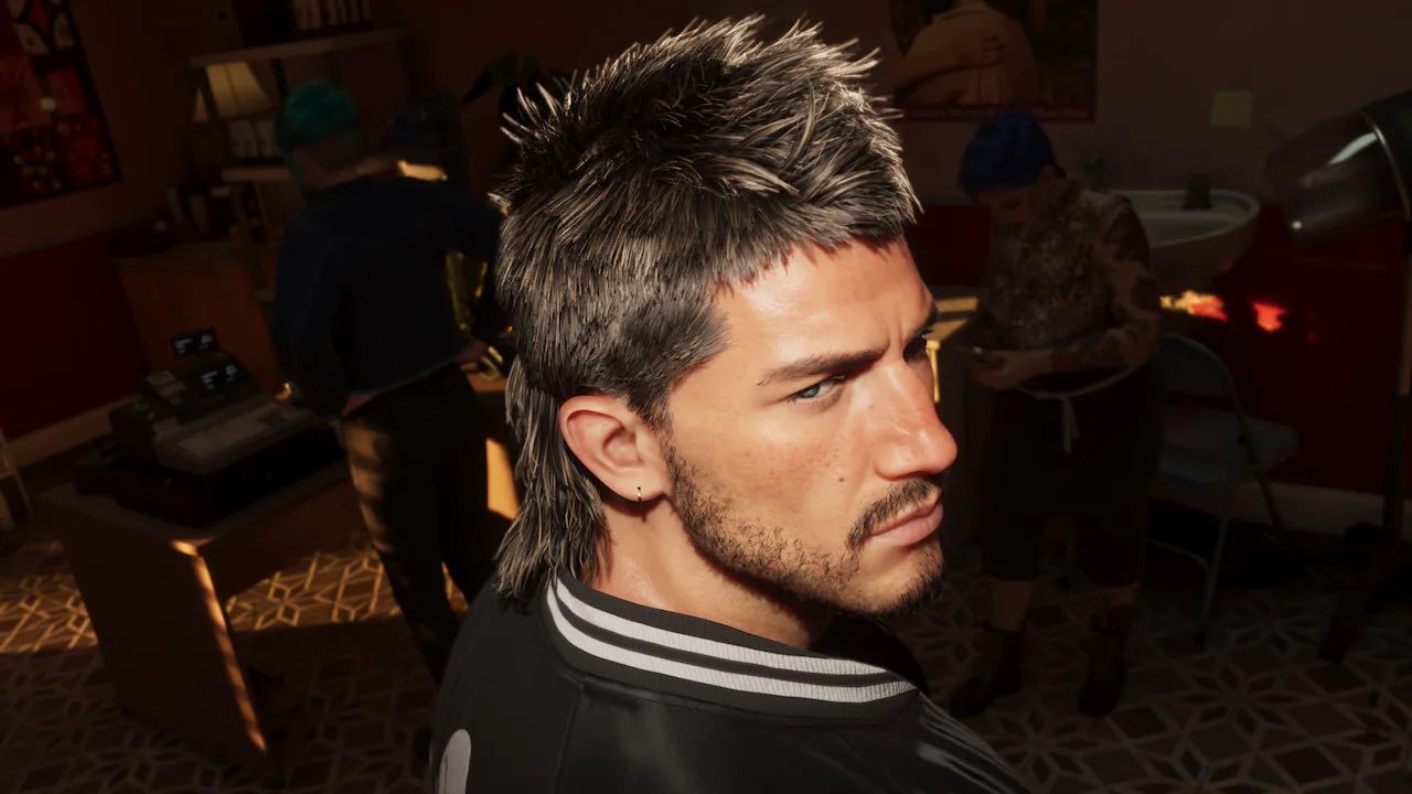Man with a Spiky Mullet Hairstyle and Stubble Looking to the Right in a Dim Indoor Setting