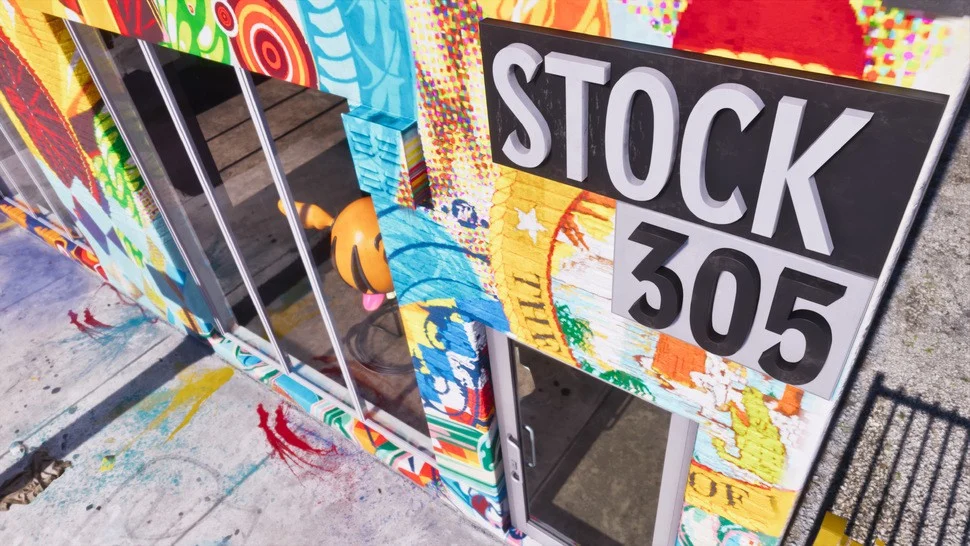 Colorful Mural covered Storefront with Glass Doors and a Bold Stock 305 Sign Above the Entrance