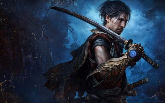Fantasy swordsman in a tattered cloak wields a large blade with a blue magical gem, set in a dark blue forest backdrop.