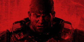 Close-up of a battle-worn soldier in tactical gear, with a fierce glare and a red color filter.